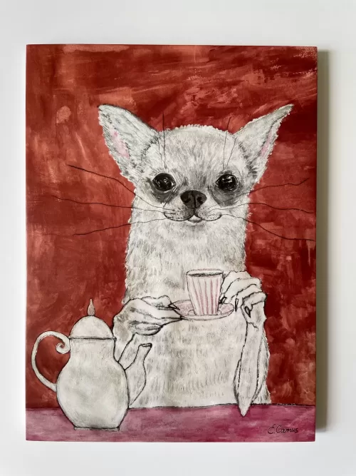 White chihuahua is having a cup of coffee