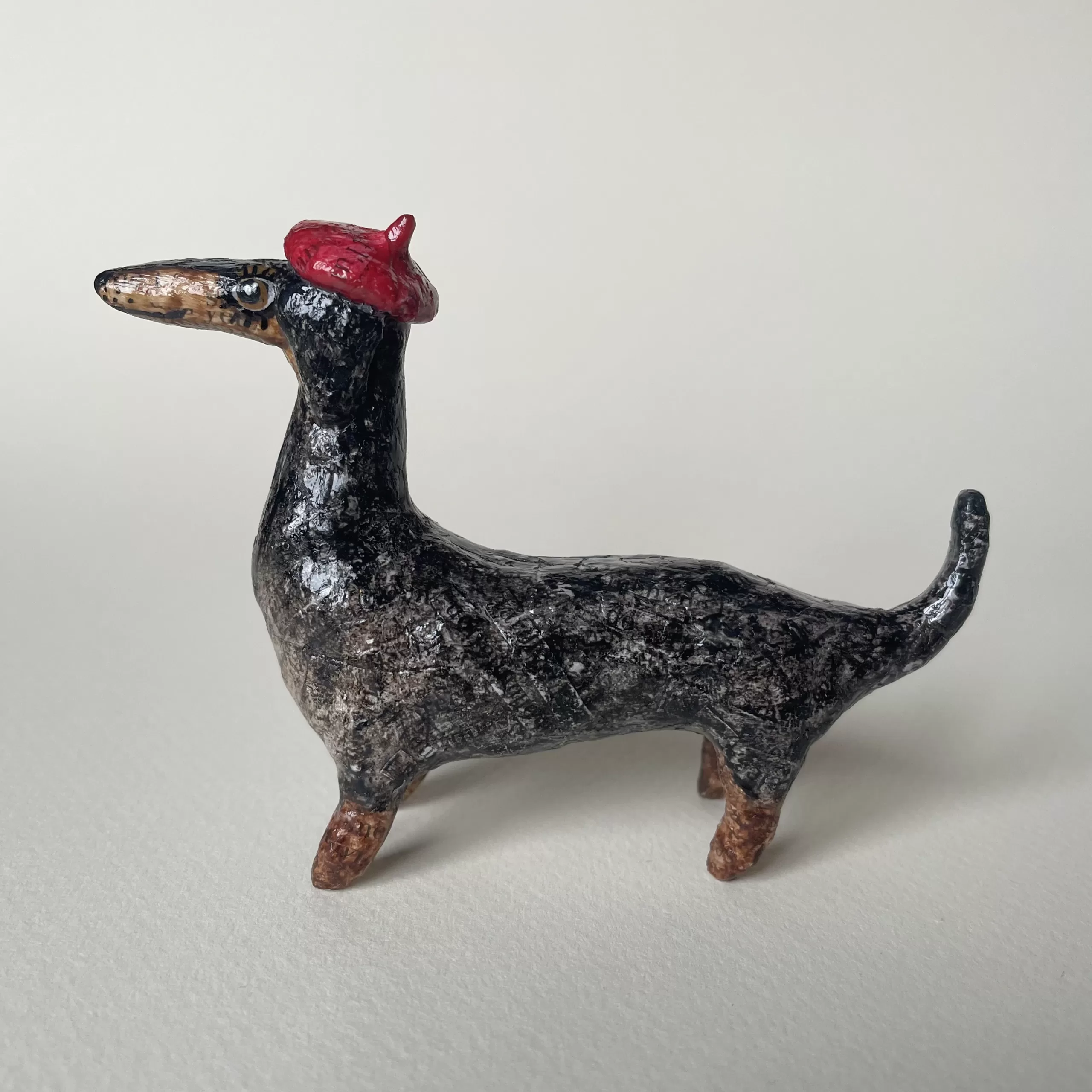 Handmade decorative paper mache dachshund figurine