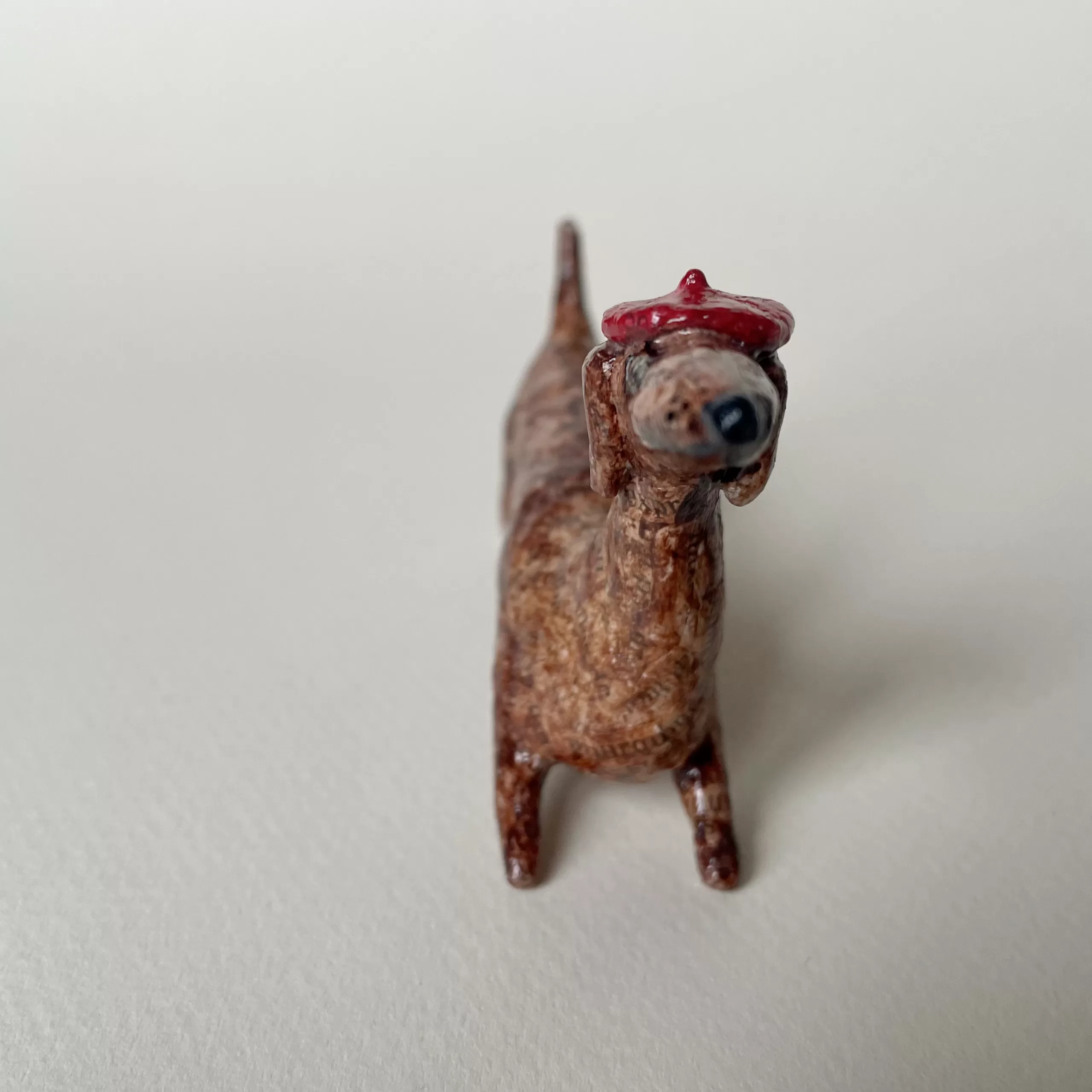 Sausage dog paper mache decorative figurine