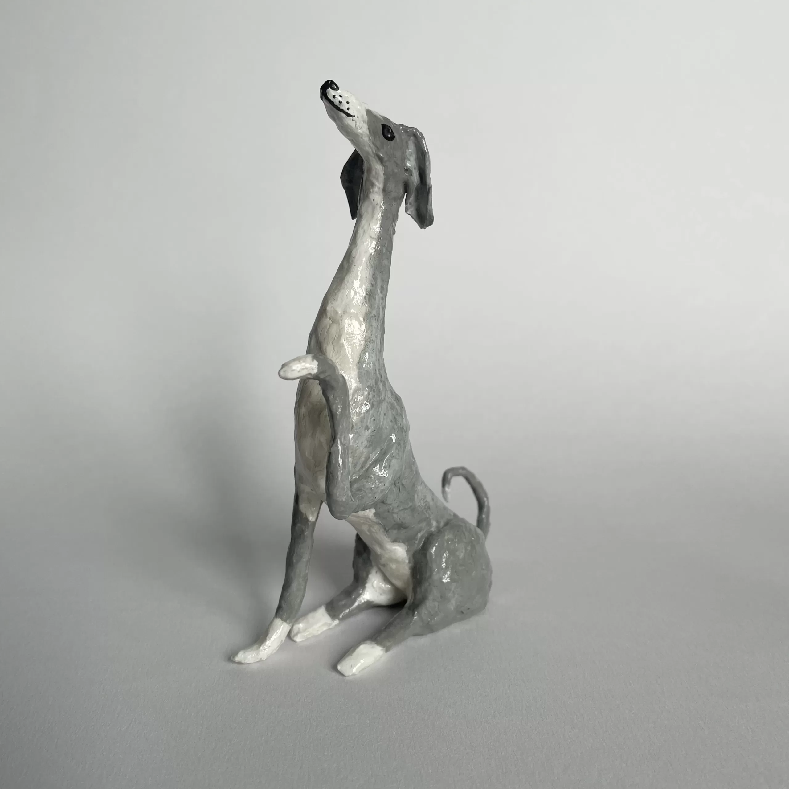 Iggy paper mache handmade figurine give paw