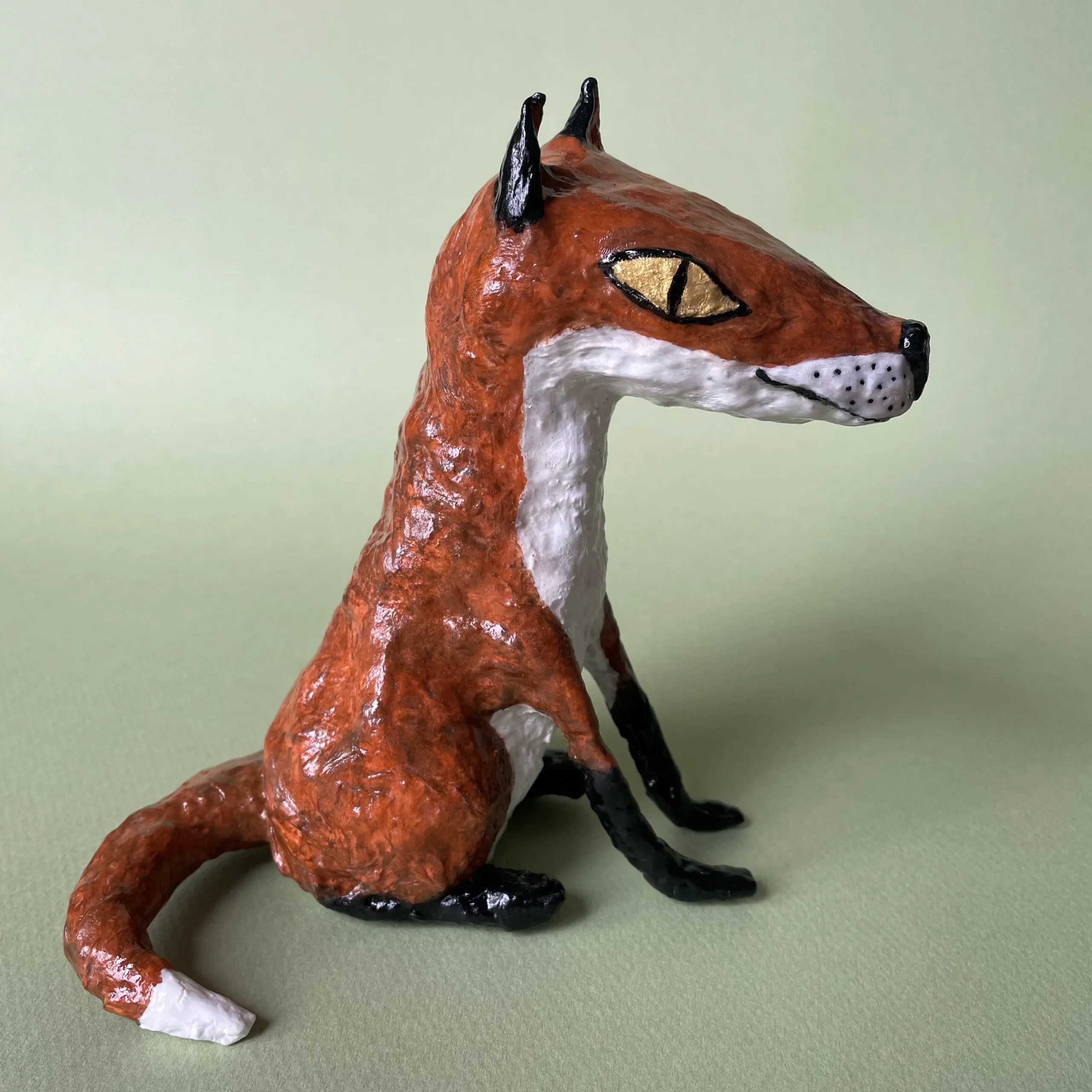 Fox paper mache figurine