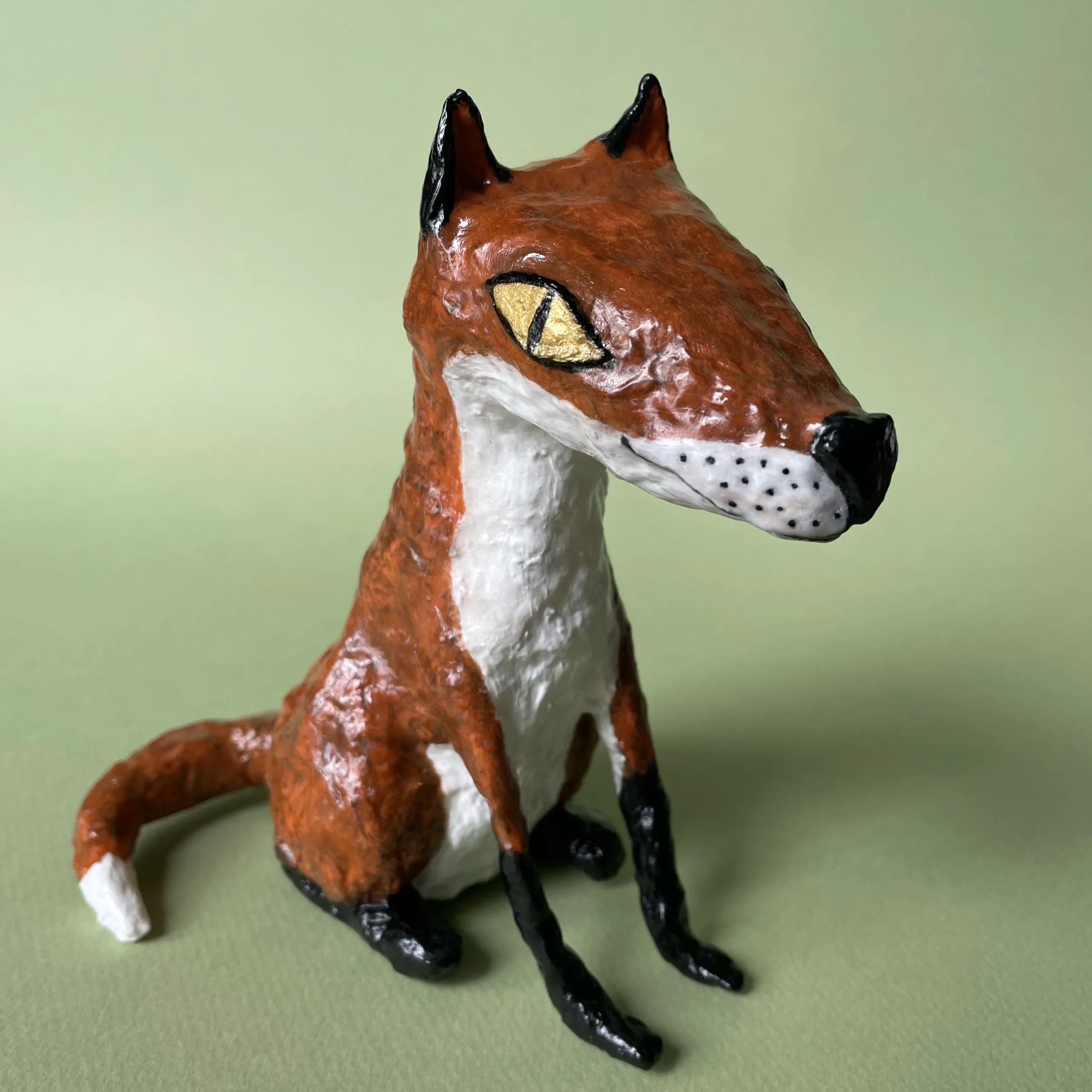 Fox figurine made of paper mache