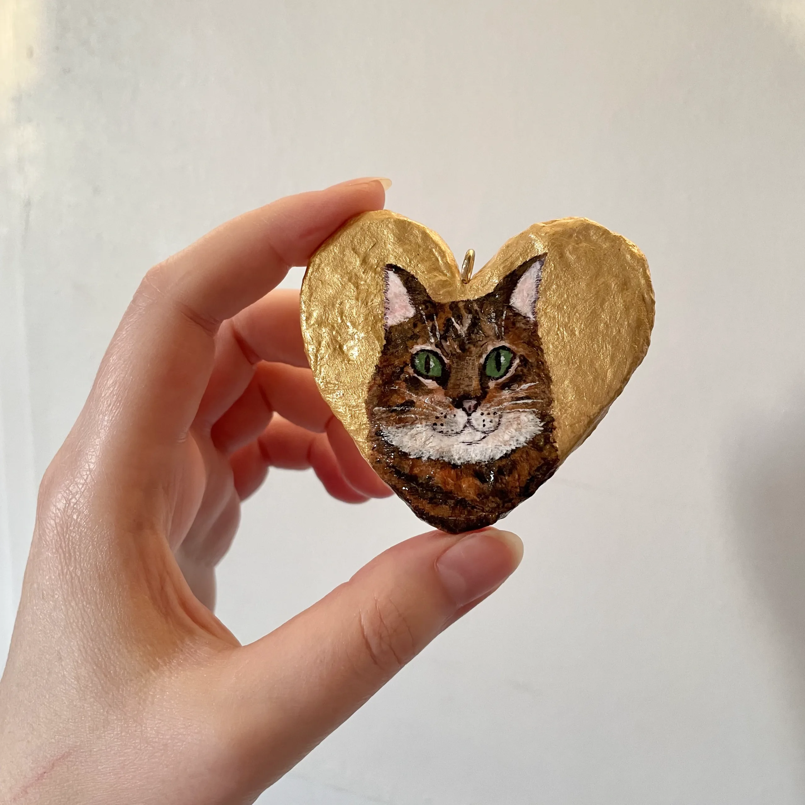 Paper mache heart with cat portrait