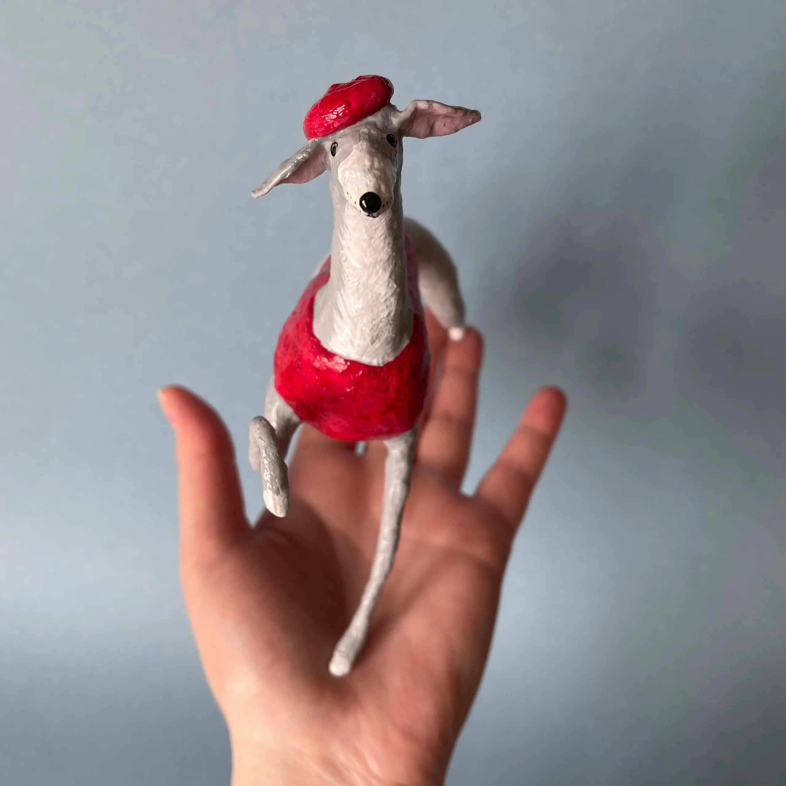 sighthound in red handmade figurine